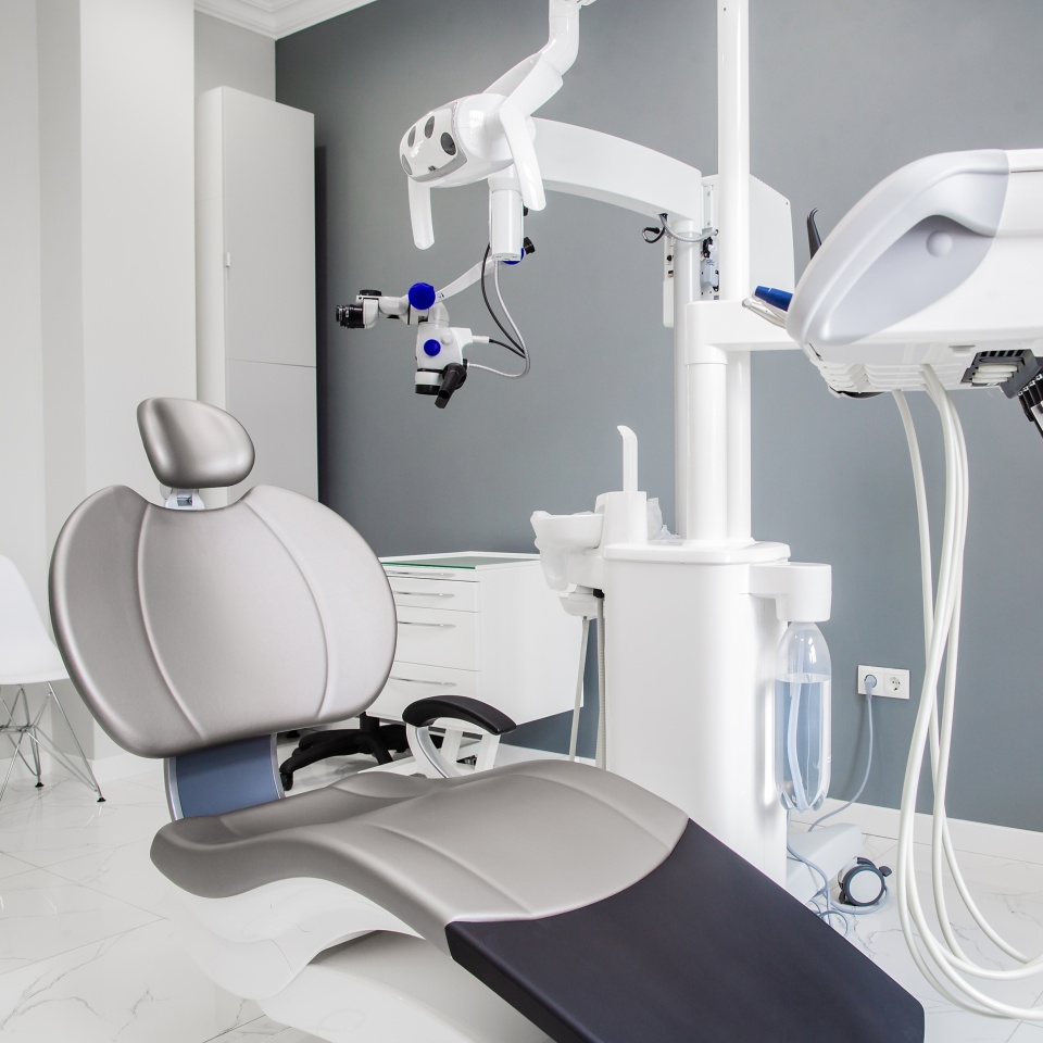 medicine, stomatology, dental clinic office, medical equipment and instruments for dentistry - dentistry equipment, gray chair, microscope